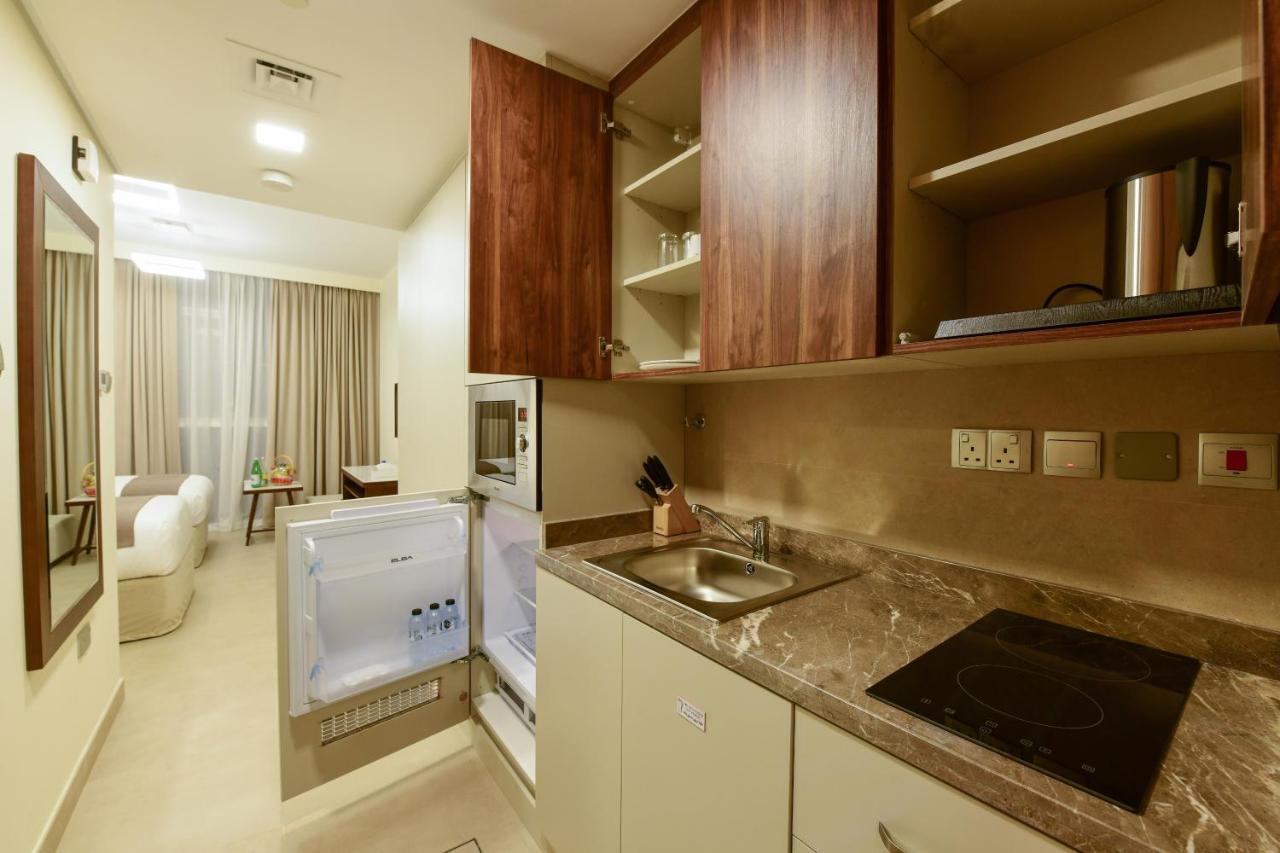 Saray Deluxe Hotel Apartments Abu Dhabi Buitenkant foto A typical studio apartment