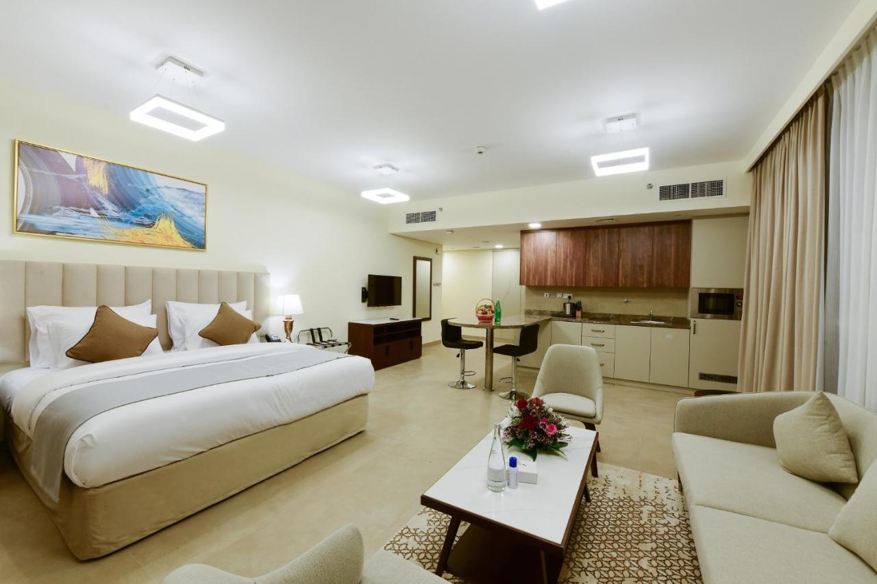 Saray Deluxe Hotel Apartments Abu Dhabi Buitenkant foto Studio apartment