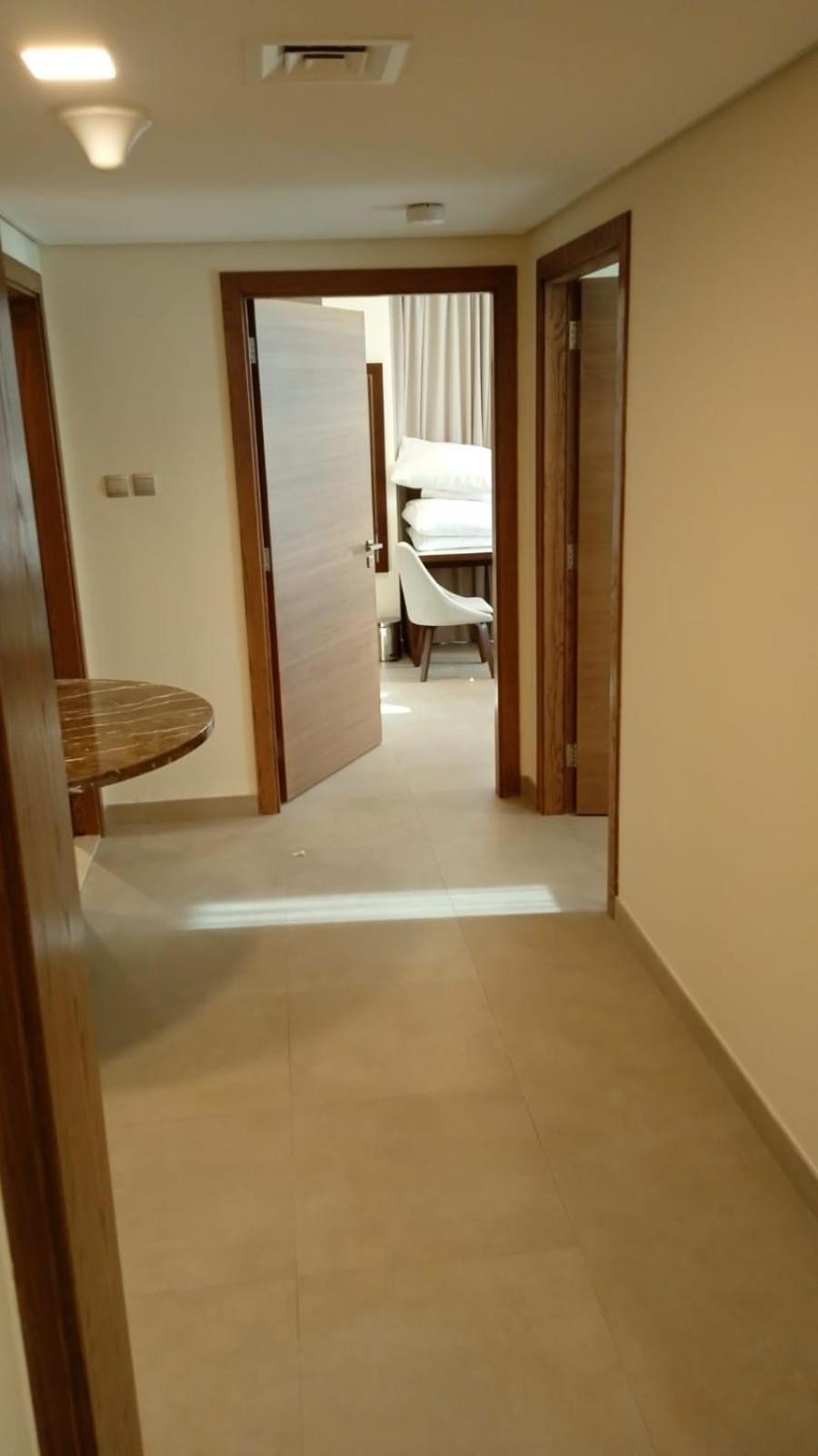 Saray Deluxe Hotel Apartments Abu Dhabi Buitenkant foto A corridor in a hotel